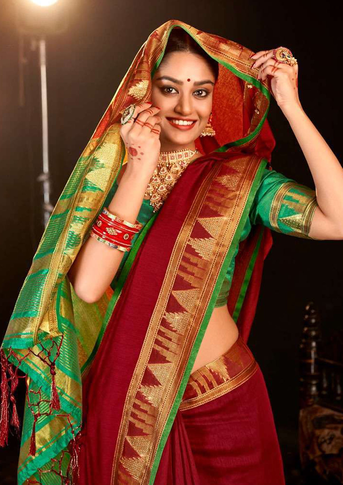 Maroon pure silk saree with green colored blouse (unstitched)