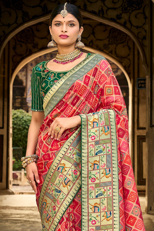 Red pure silk saree with heavy aanchal golden border and green printed blouse (Unstitched)
