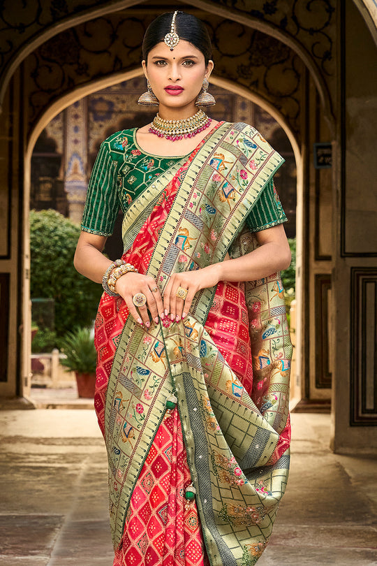 Red pure silk saree with heavy aanchal golden border and green printed blouse (Unstitched)