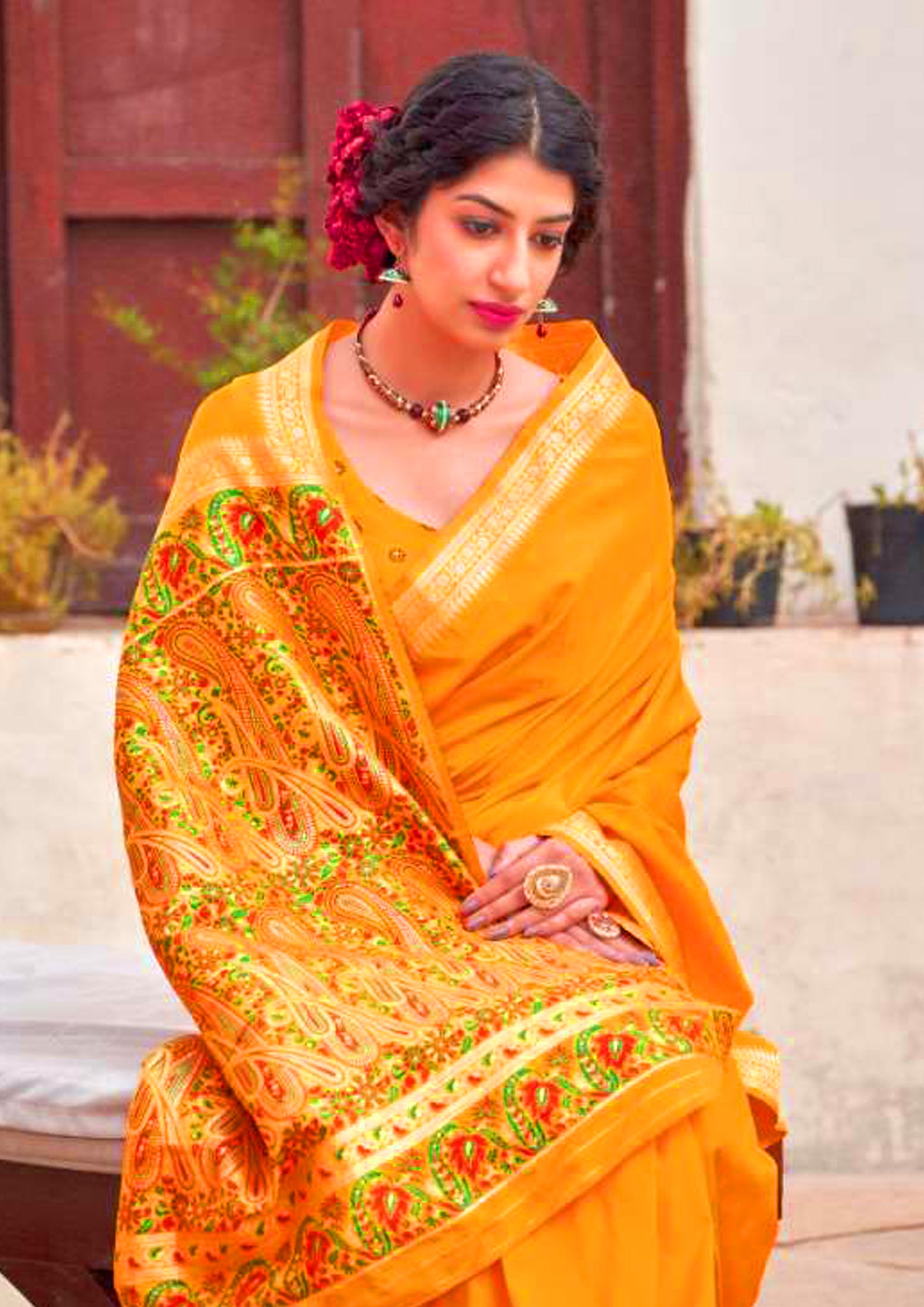 Orange pure silk saree with heavy aanchal printed golden border (unstitched)