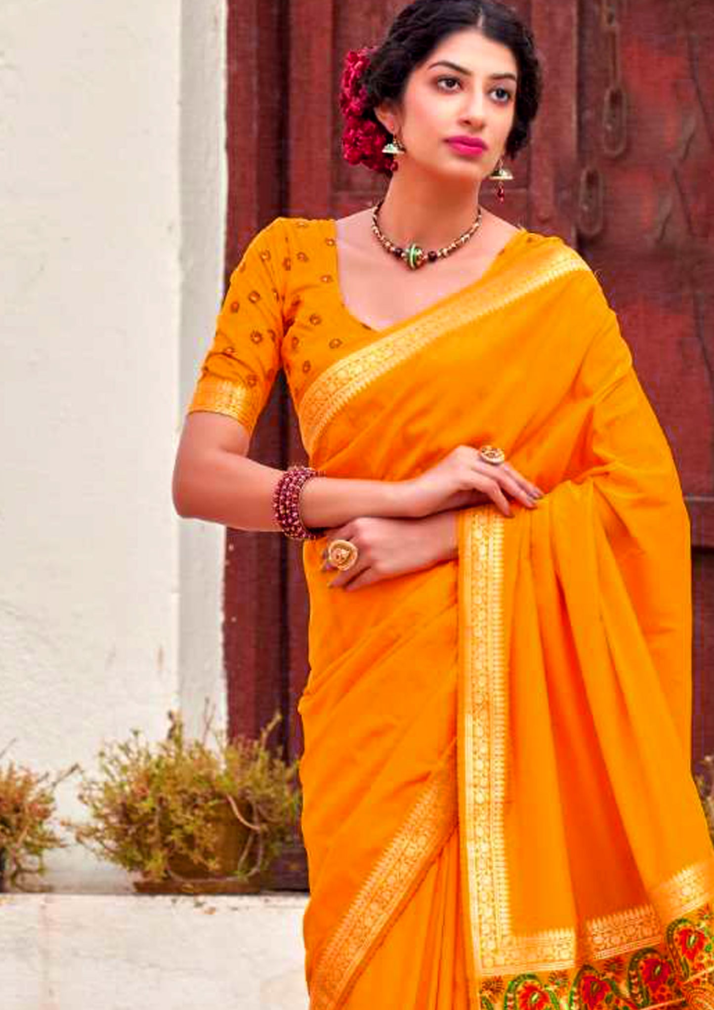 Orange pure silk saree with heavy aanchal printed golden border (unstitched)