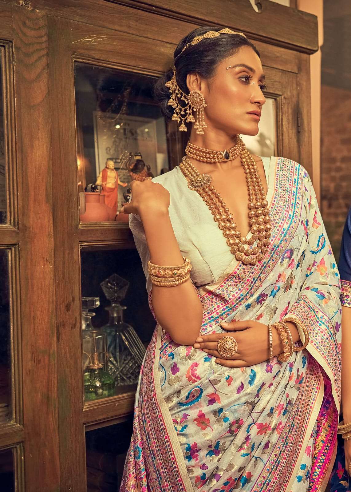 White silk saree with heavy aanchal golden border and printed blouse (Unstitched)