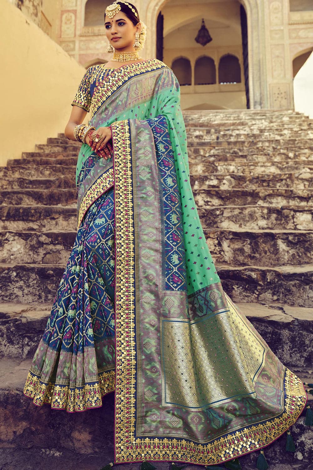 Blue pure silk saree with heavy aanchal golden border and printed blouse (Unstitched)