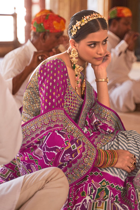 Purple Patola pure silk saree with heavy aanchal golden border and printed blouse (Unstitched)