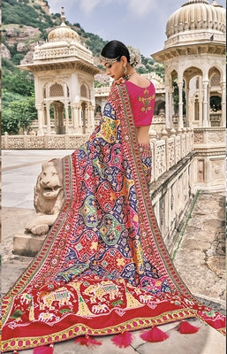 Blue Patola pure silk saree with heavy aanchal Red border and printed blouse (Unstitched)