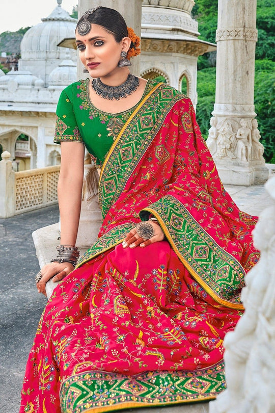 Red pure silk saree with heavy aanchal green golden border and green printed blouse (Unstitched)