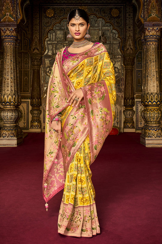 Yellow pure silk saree with heavy aanchal pink golden border and pink printed blouse (Unstitched)