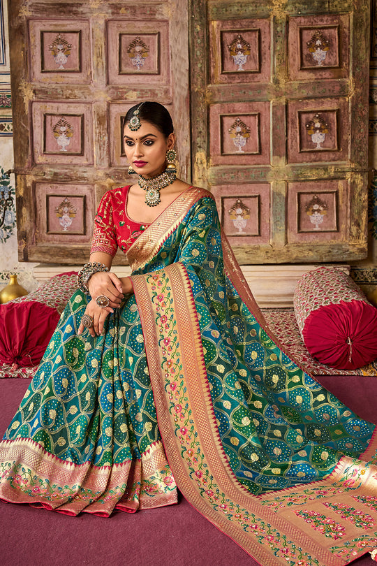 Green pure silk saree with heavy aanchal golden border and red printed blouse (Unstitched)