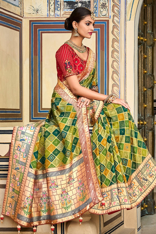 Green pure silk saree with heavy aanchal  golden border and red printed blouse (Unstitched)