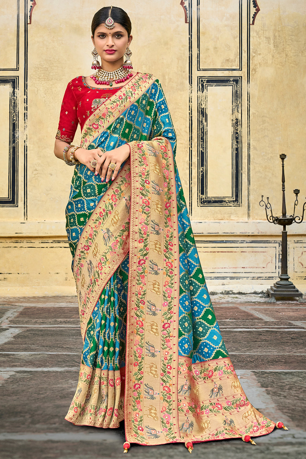 Green pure silk saree with heavy aanchal golden border and red printed blouse (Unstitched)