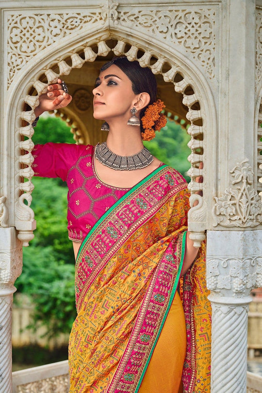 Orange pure silk saree with heavy aanchal pink golden border and pink printed blouse (Unstitched)