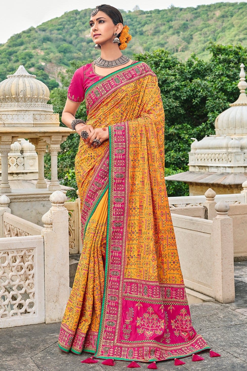 Yellow Banarasi pure silk saree with heavy aanchal pink border and printed blouse (Unstitched)