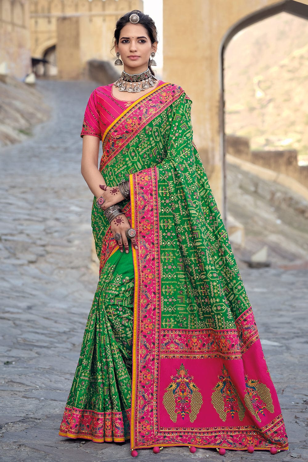 Green pure silk saree with heavy aanchal pink golden border and printed blouse (Unstitched)