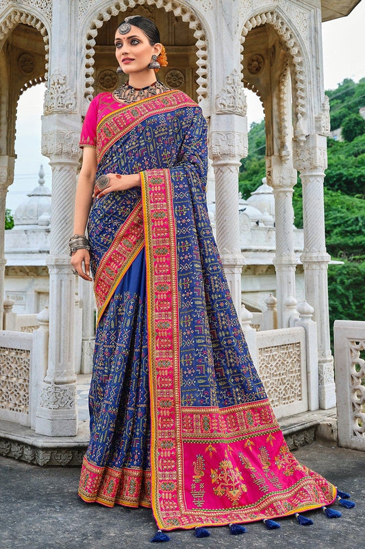 Blue pure silk saree with heavy aanchal pink golden border and pink printed blouse (Unstitched)