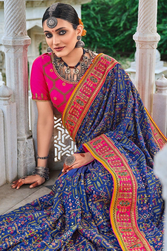 Midnight Blue Banarasi pure silk saree with heavy aanchal Pink border and printed blouse (Unstitched)