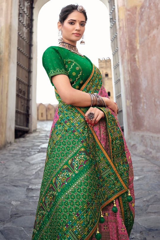 Green pure silk saree with heavy aanchal pink golden border and green printed blouse (Unstitched)