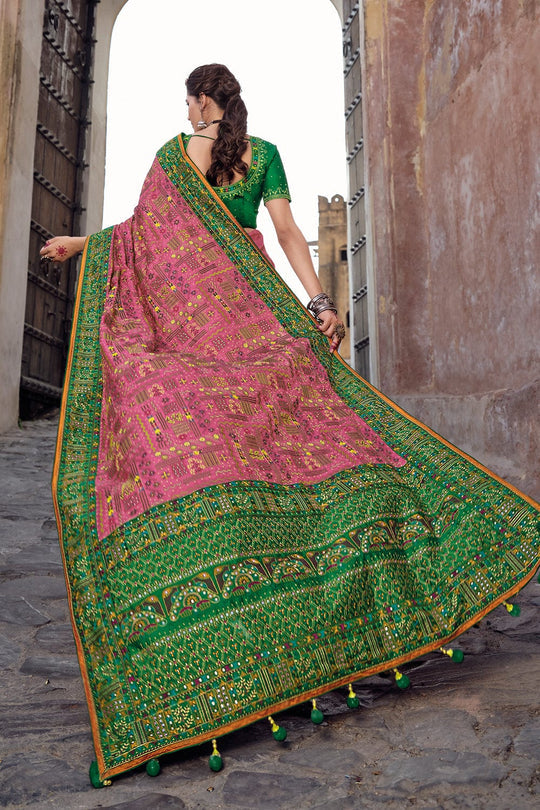 Green pure silk saree with heavy aanchal pink golden border and green printed blouse (Unstitched)