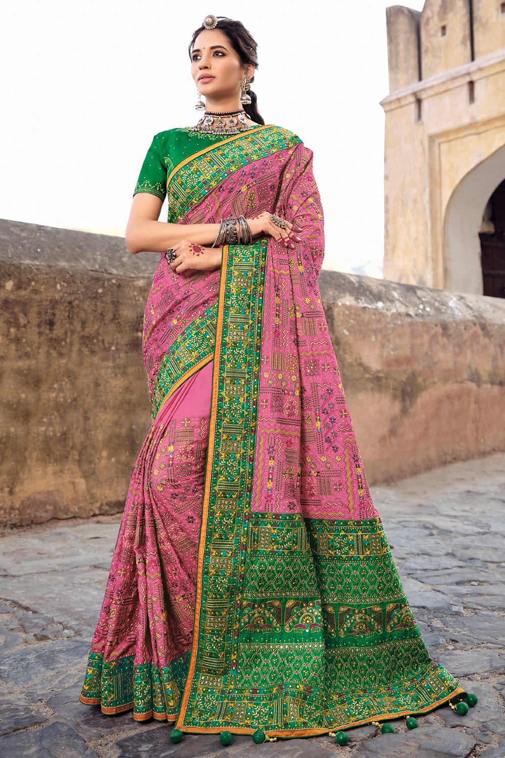 Green pure silk saree with heavy aanchal pink golden border and green printed blouse (Unstitched)