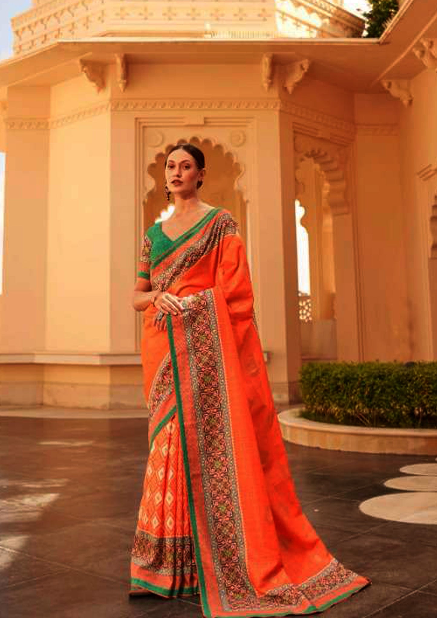 Orange pure silk saree printed border and green blouse (unstitched)