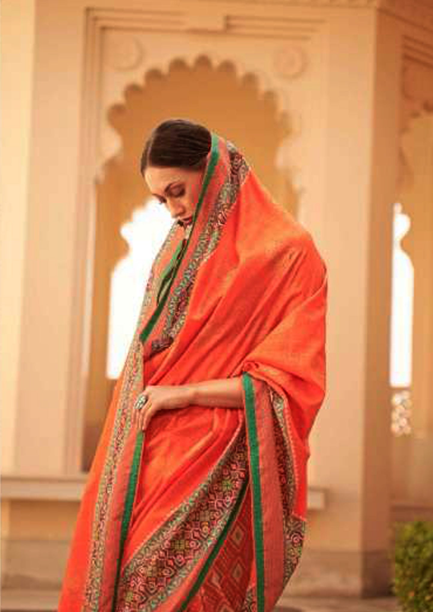 Orange pure silk saree printed border and green blouse (unstitched)