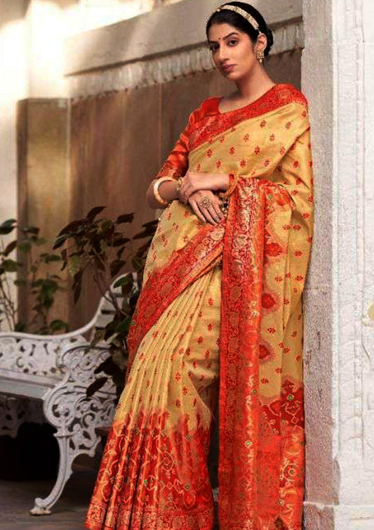 Royal Golden pure silk saree with red border and blouse (unstitched)