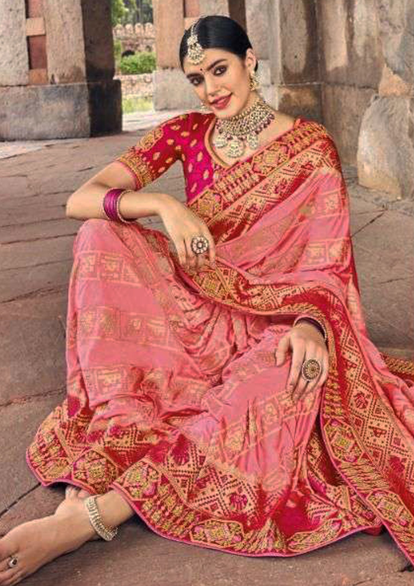 Pink pure silk saree with golden border and pink colored blouse (Unstitched)