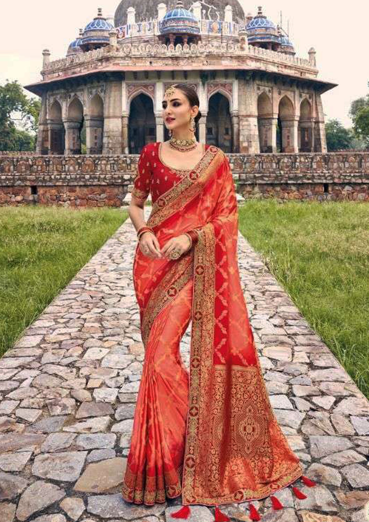 Red pure silk saree with golden border and red colored blouse (Unstitched)