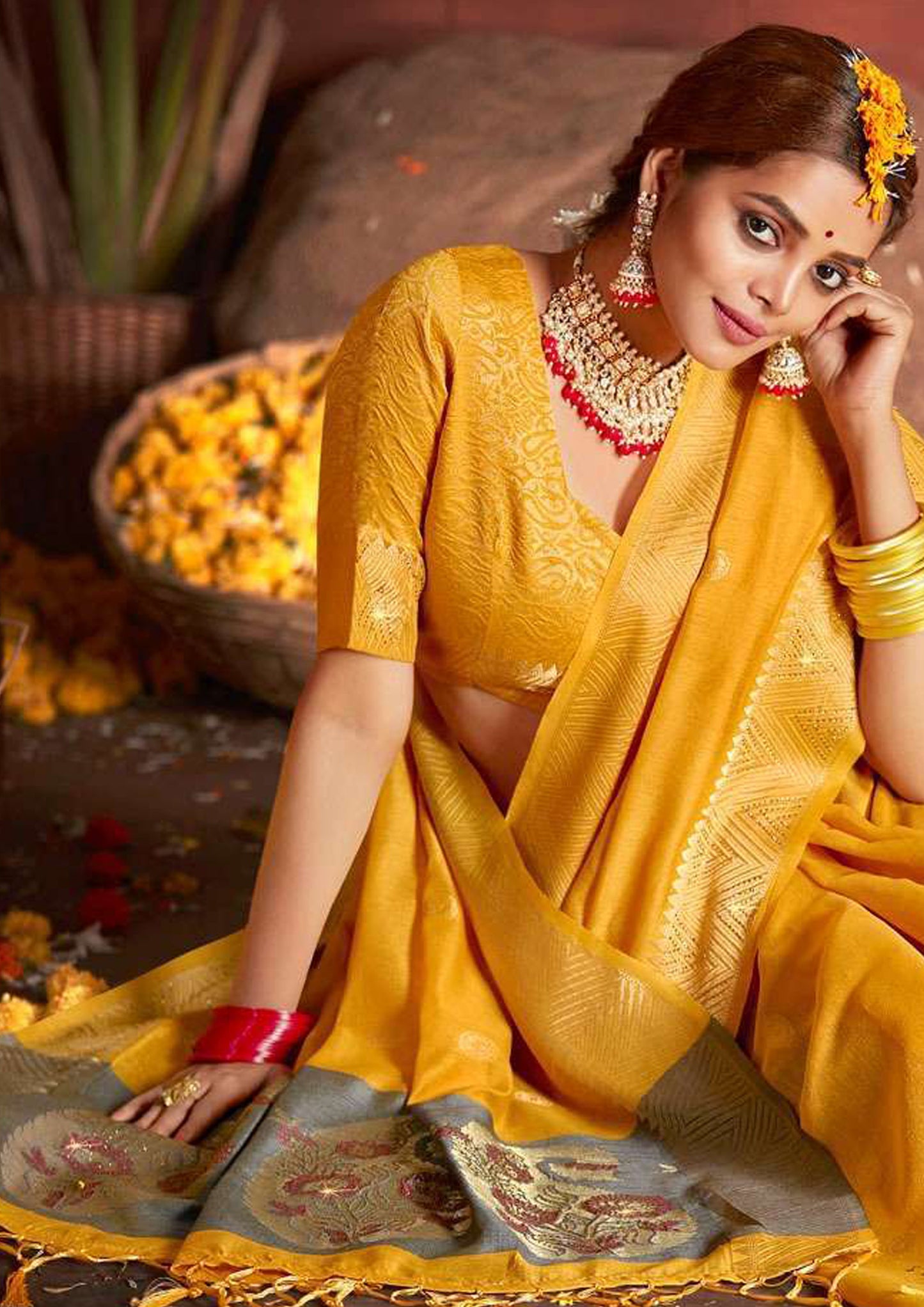 Yellow pure silk saree with golden border and matching blouse (Unstitched)