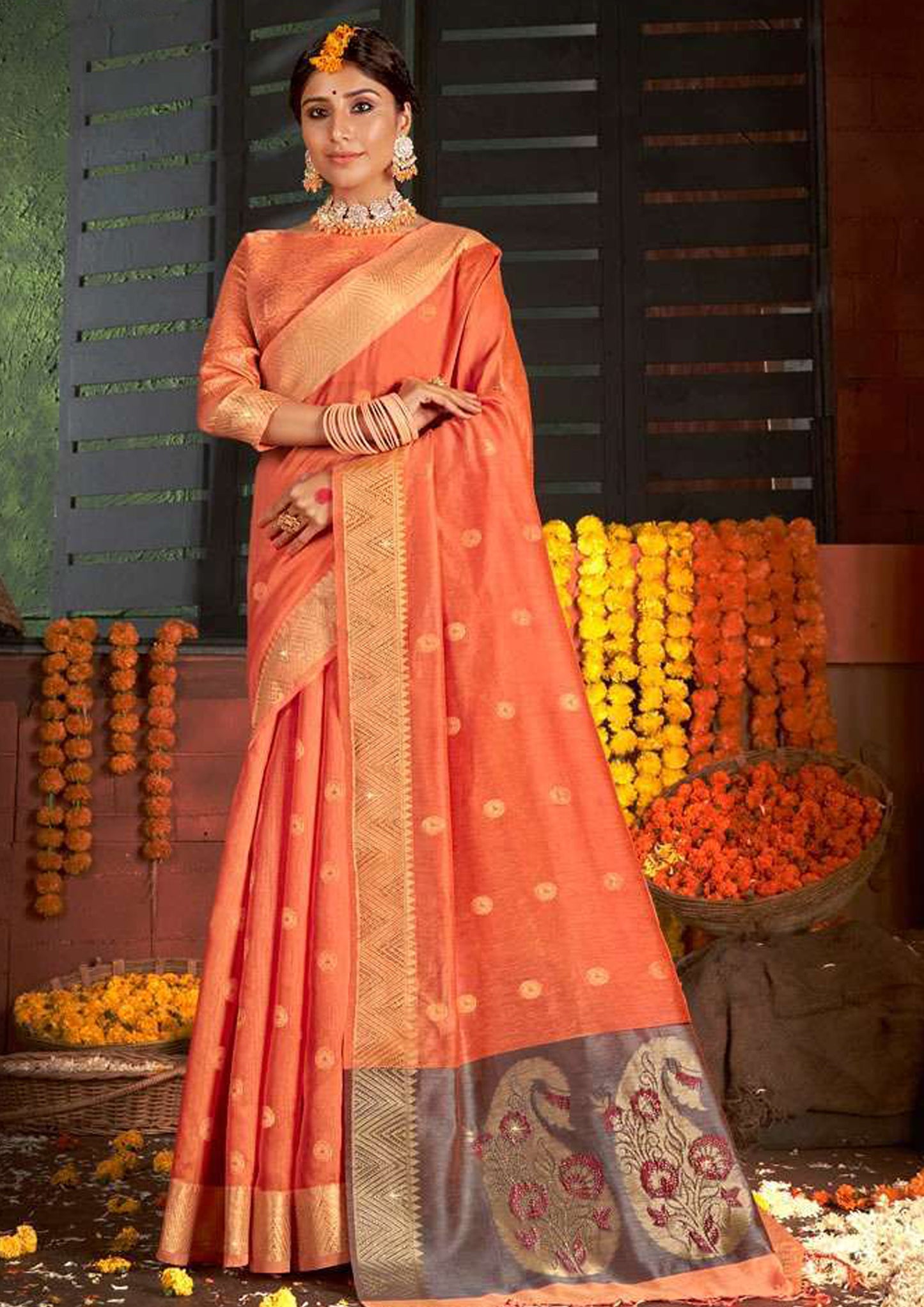 Orange pure silk saree with golden border and orange colored blouse (unstitched)