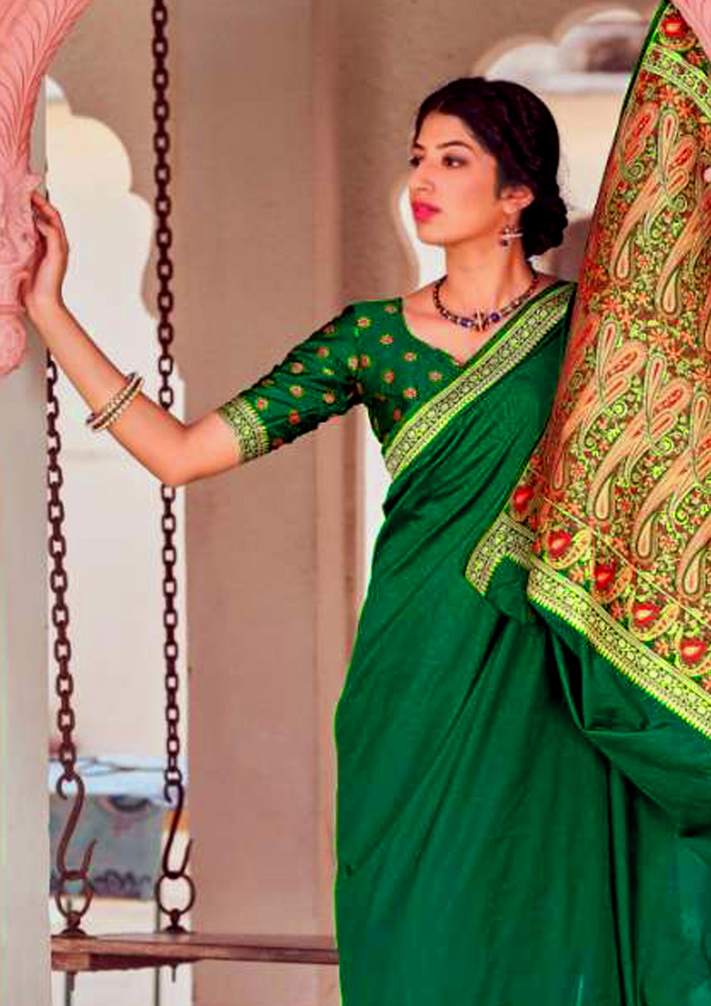 Green pure silk saree with heavy aanchal golden border and matching blouse (unstitched)