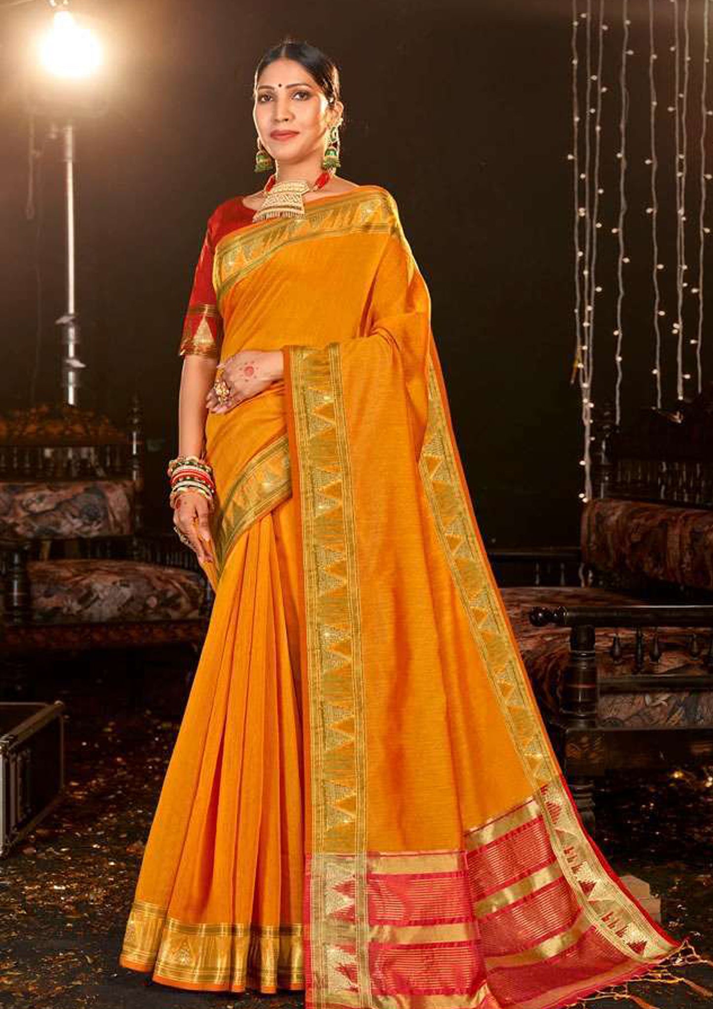 Orange pure silk saree with golden border and Red colored blouse (unstitched)