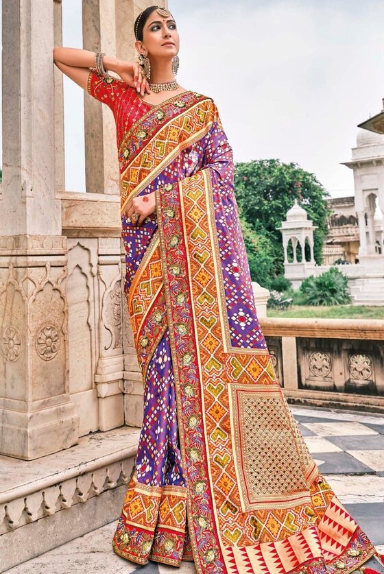 Purple Patola pure silk saree with heavy aanchal golden and Red border and printed blouse (Unstitched)