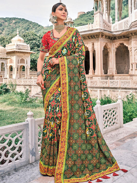 Bottle Green Patola pure silk saree with heavy aanchal golden and Red border and printed blouse (Unstitched)