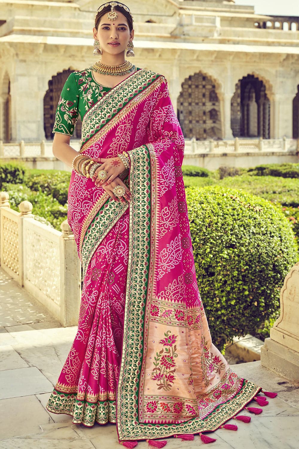 Pink pure silk saree with heavy aanchal golden border and printed blouse (Unstitched)