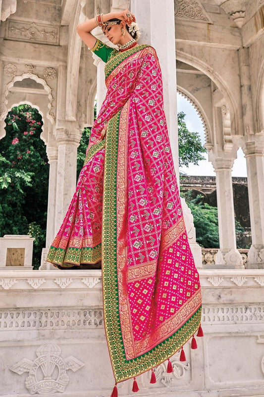 Pink Patola pure silk saree with heavy aanchal golden and Green border and printed blouse (Unstitched)