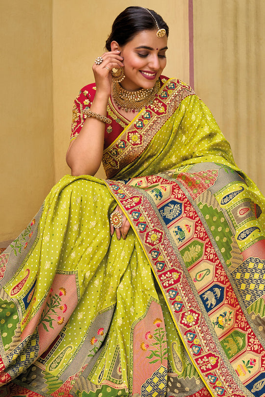 Light Green pure silk saree with heavy aanchal golden border and printed blouse (Unstitched)