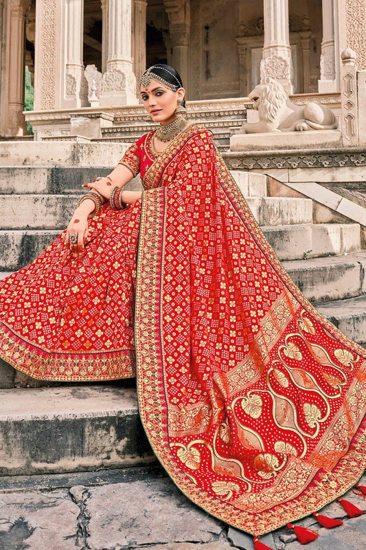 Red Patola pure silk saree with heavy aanchal golden border and printed blouse (Unstitched)