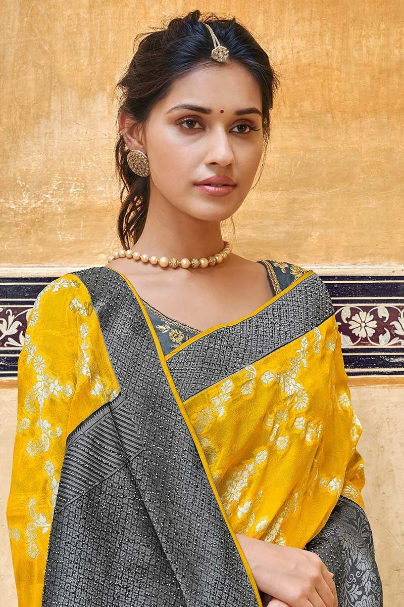 Yellow pure silk saree with heavy aanchal golden border and printed blouse (Unstitched)