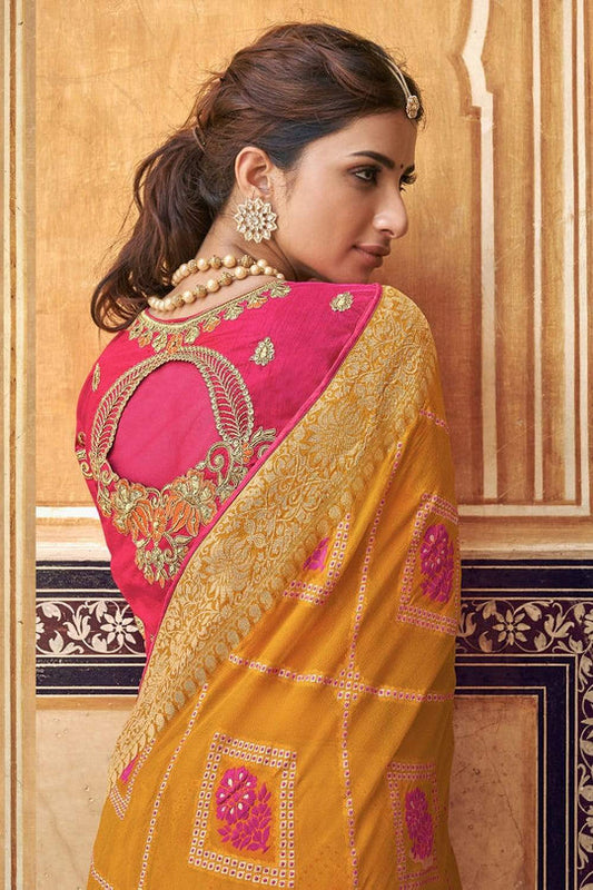 Orange pure silk saree with heavy aanchal golden border and printed blouse (Unstitched)