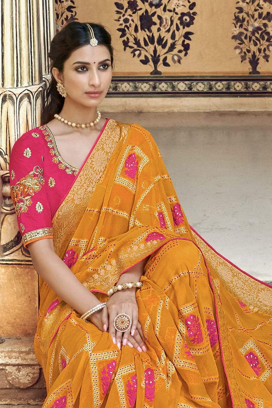 Orange pure silk saree with heavy aanchal golden border and printed blouse (Unstitched)