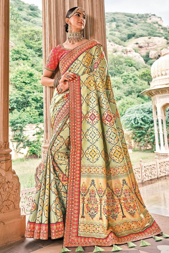 Light Green Patola pure silk saree with heavy aanchal Red border and printed blouse (Unstitched)