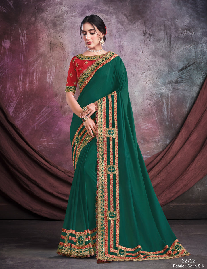 Green pure silk saree with heavy aanchal golden border and red printed blouse (Unstitched)