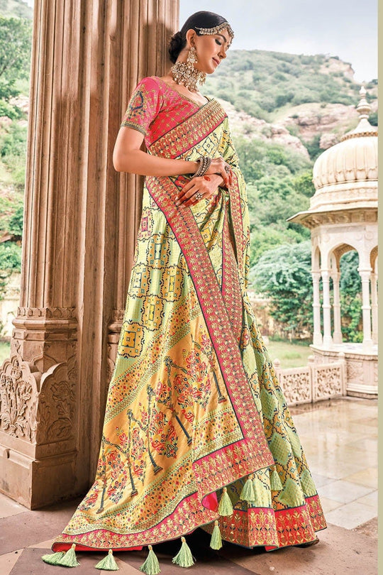 Light Green Patola pure silk saree with heavy aanchal Red border and printed blouse (Unstitched)