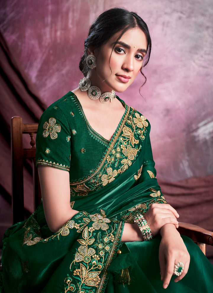 Green pure silk saree with heavy aanchal golden border and green printed blouse (Unstitched)