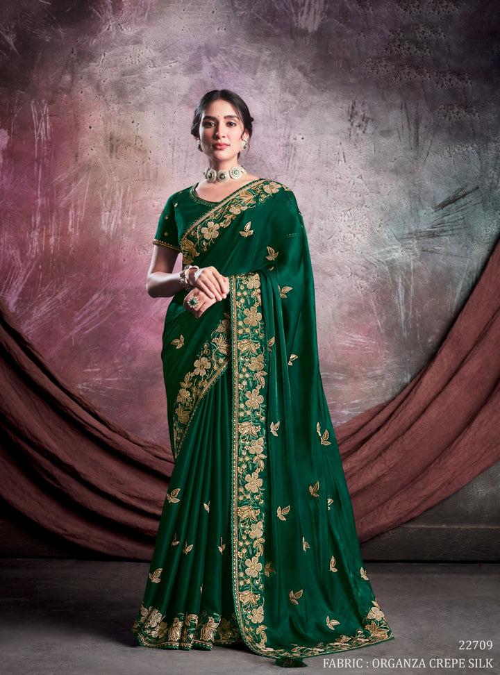 Green pure silk saree with heavy aanchal golden border and green printed blouse (Unstitched)