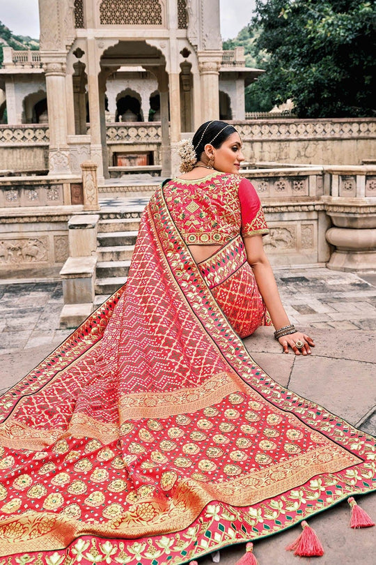 Red Patola pure silk saree with heavy aanchal Golden border and printed blouse (Unstitched)