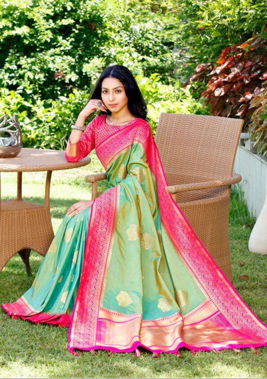 Pink and green pure silk saree with heavy aanchal golden printed border and printed pink blouse (Unstitched)