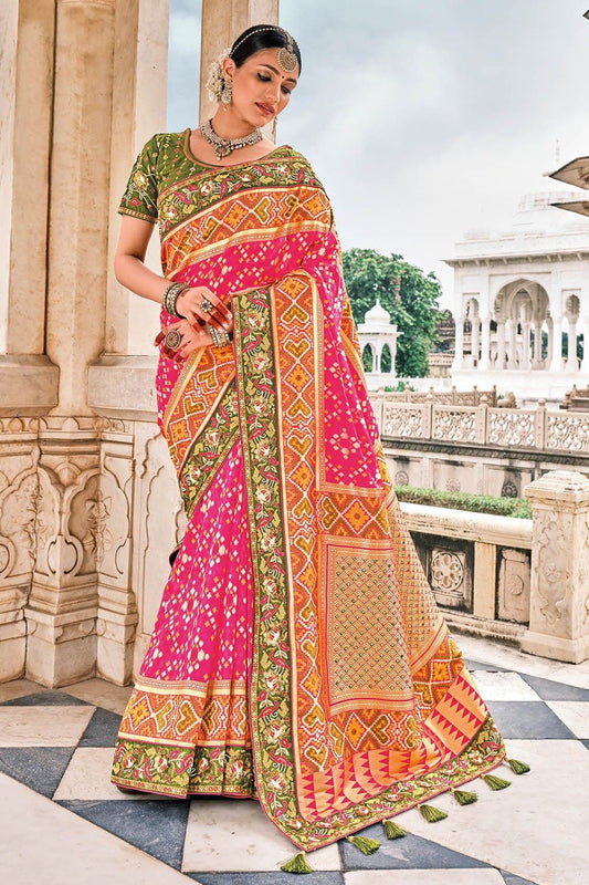 Pink and Orange Patola pure silk saree with heavy aanchal Green border and printed blouse (Unstitched)