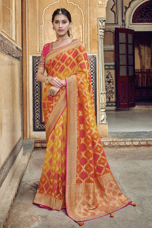 Orange pure silk saree with heavy aanchal golden border and printed blouse (Unstitched)