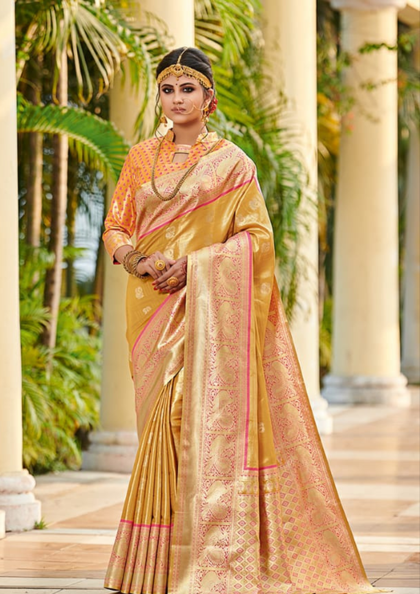 Yellow pure silk saree with heavy aanchal golden border and printed blouse (Unstitched)